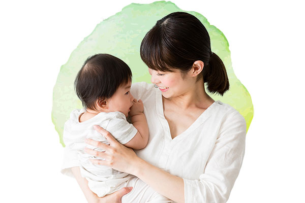 赤ちゃんを抱く女性